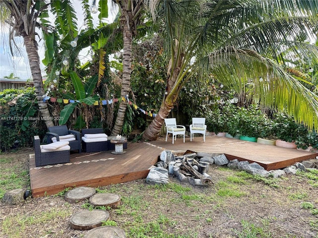 wooden deck featuring an outdoor hangout area