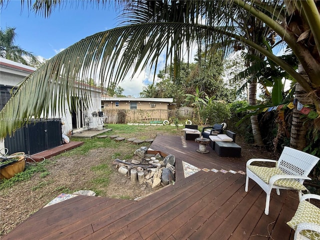 wooden terrace featuring outdoor lounge area