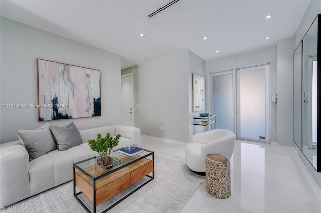 living area with recessed lighting