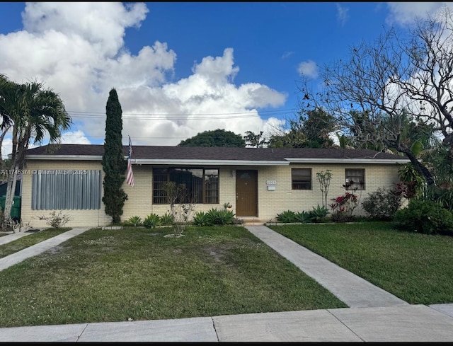 ranch-style house with a front yard