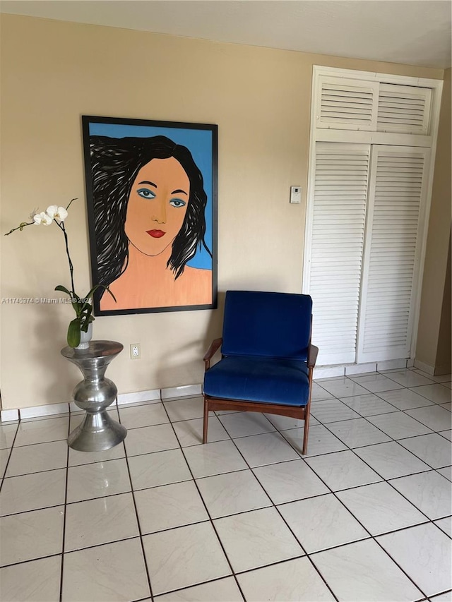 living area featuring light tile patterned floors