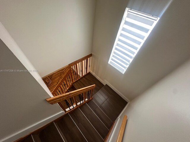 13926 SW 164th St, Miami, FL 33177 - staircase featuring wood finished floors