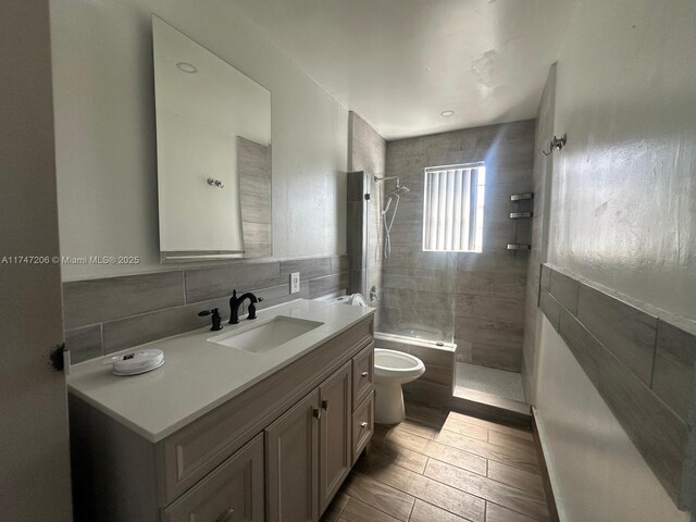 13926 SW 164th St, Miami, FL 33177 - full bathroom with tile walls, a tile shower, toilet, and vanity
