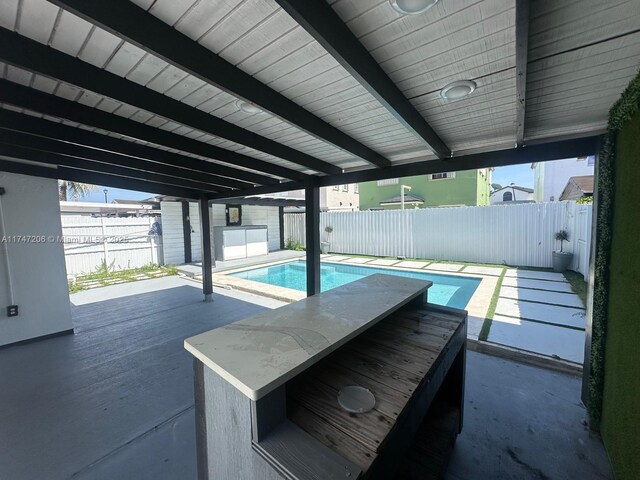 13926 SW 164th St, Miami, FL 33177 - view of swimming pool with a fenced backyard and a patio area