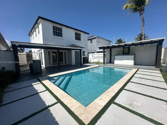13926 SW 164th St, Miami, FL 33177 - view of pool featuring a patio area, fence, and cooling unit