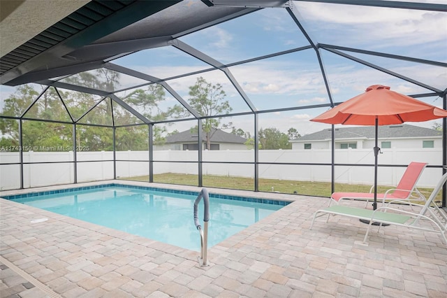 view of pool featuring a lanai, a patio area, a fenced backyard, and a fenced in pool