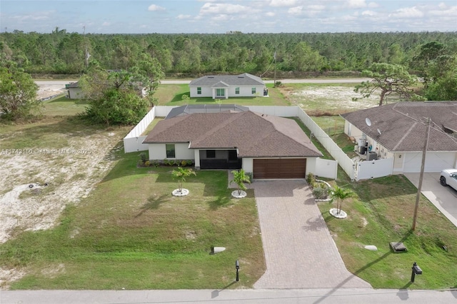 drone / aerial view with a view of trees