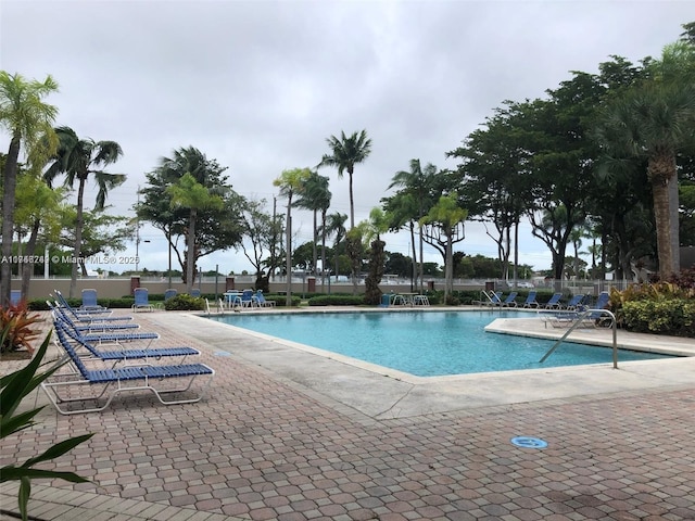 view of swimming pool featuring a patio