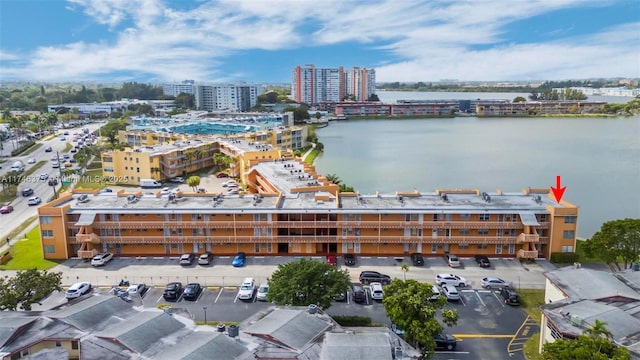 drone / aerial view with a water view