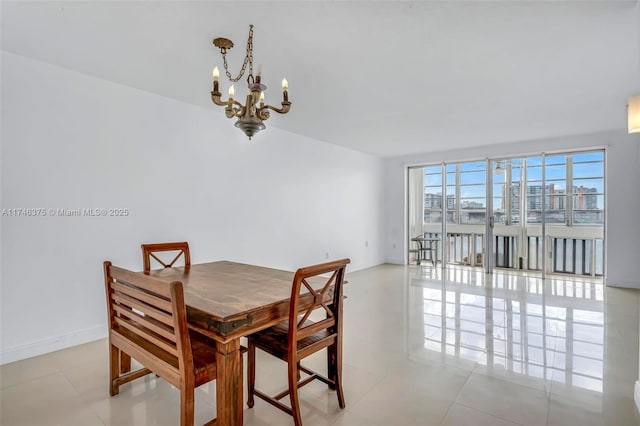 tiled dining space with a chandelier and floor to ceiling windows