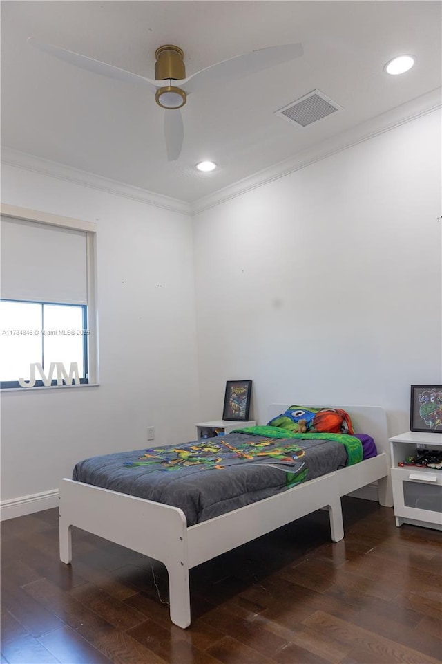 bedroom featuring crown molding, ceiling fan, and wood-type flooring