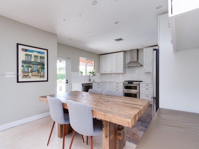 dining space with sink
