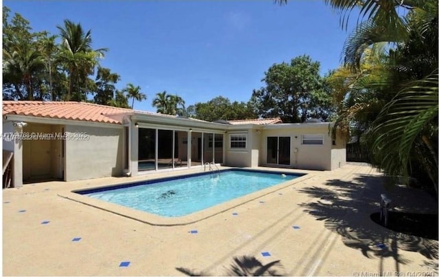 view of pool with a patio