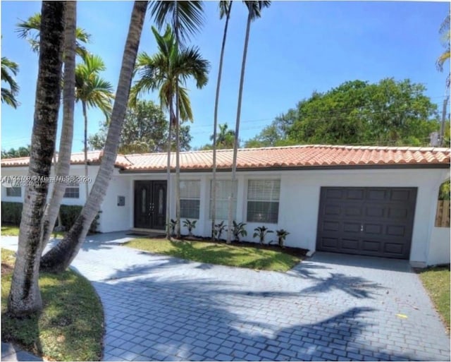 view of front of house with a garage