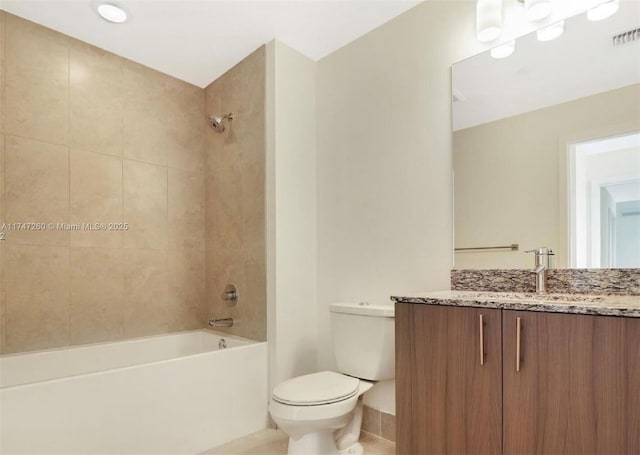 full bath featuring toilet, tile patterned floors, vanity, shower / bathtub combination, and baseboards