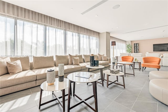 living area featuring light tile patterned flooring