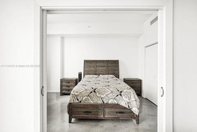 bedroom with concrete floors