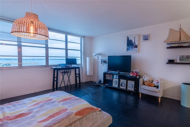 bedroom featuring baseboards