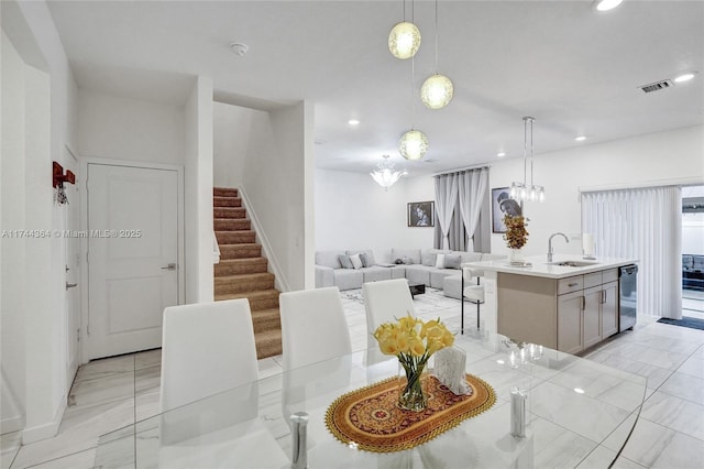 dining room with a chandelier, recessed lighting, visible vents, and stairway