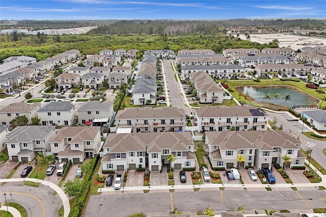 aerial view featuring a water view and a residential view