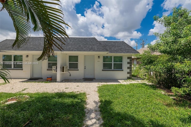 view of front of home with a front yard