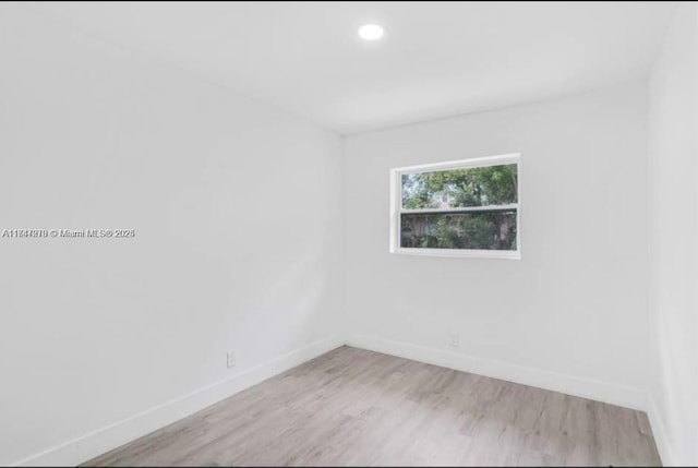 empty room featuring light hardwood / wood-style floors