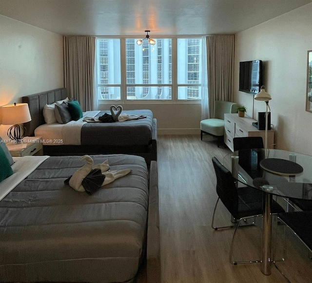 bedroom featuring hardwood / wood-style flooring