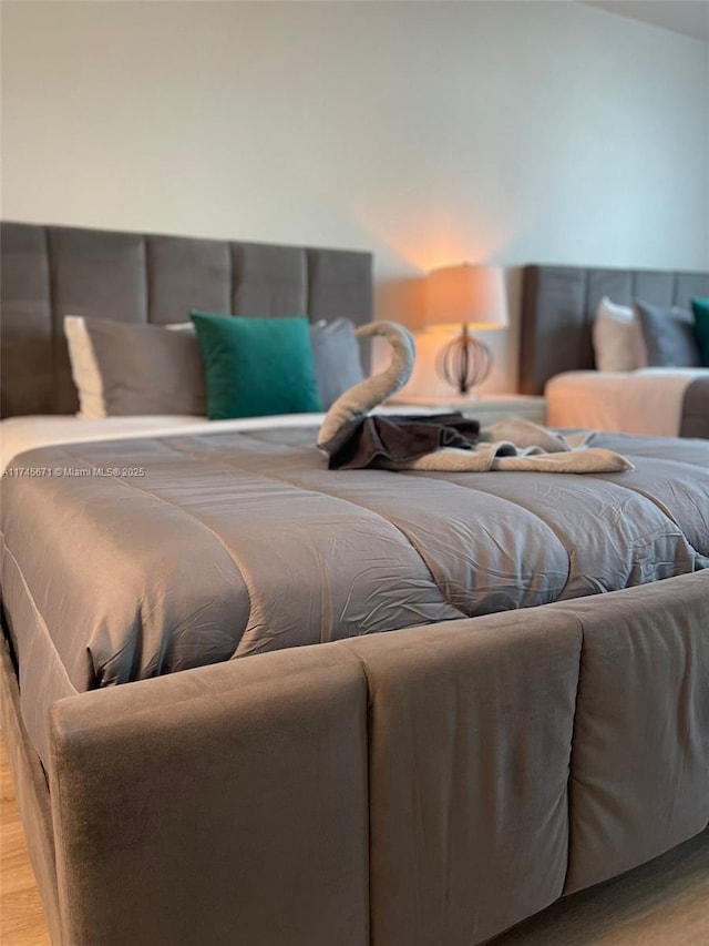 bedroom featuring wood-type flooring