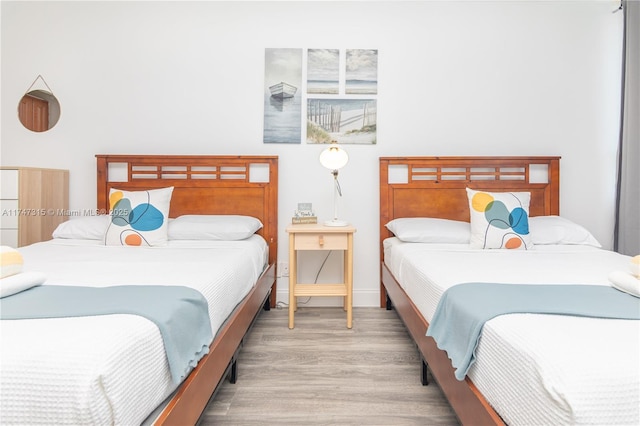 bedroom featuring hardwood / wood-style flooring