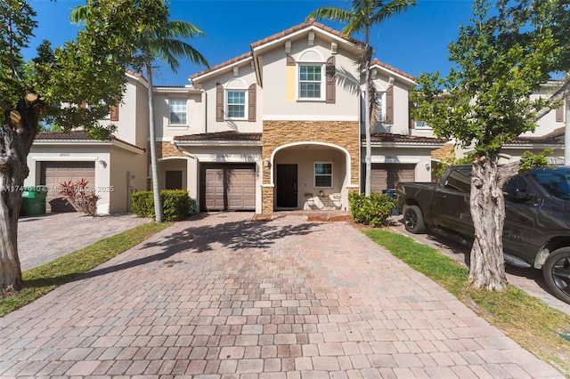 view of front of property featuring a garage