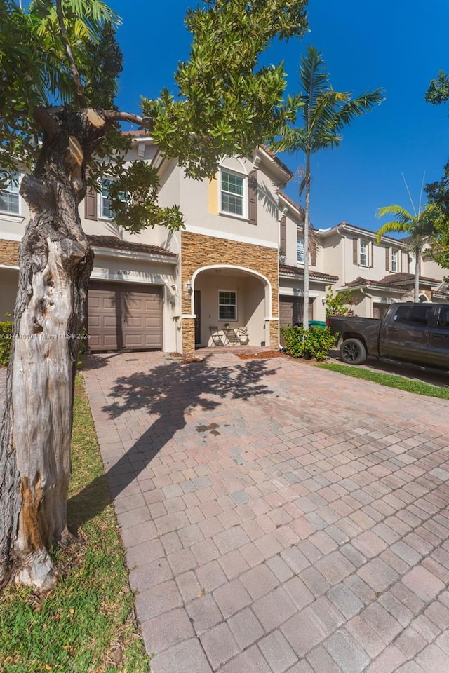 view of front of home with a garage