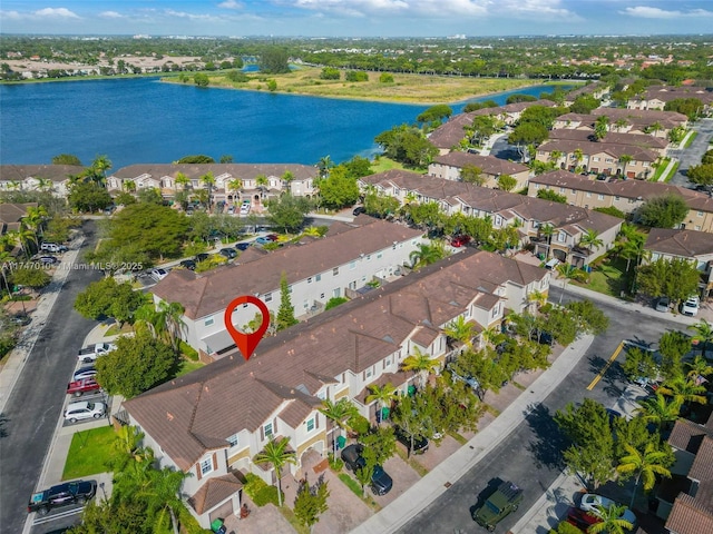 drone / aerial view featuring a water view