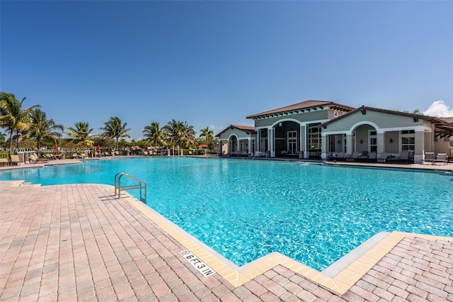 view of swimming pool featuring a patio