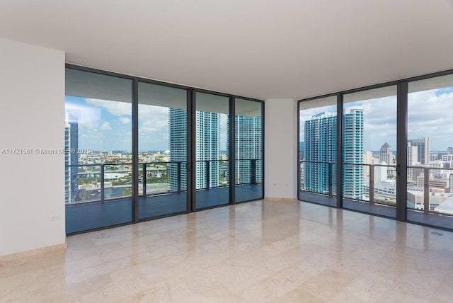 68 SE 6th St Unit 2112, Miami, FL 33131 - empty room featuring floor to ceiling windows