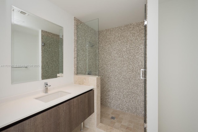 68 SE 6th St Unit 2112, Miami, FL 33131 - bathroom with vanity and walk in shower