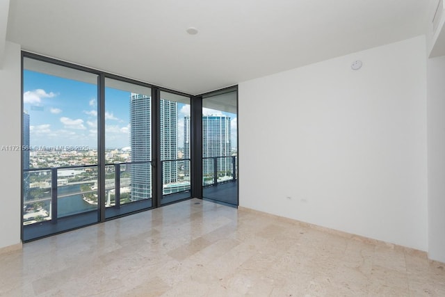 68 SE 6th St Unit 2112, Miami, FL 33131 - spare room with expansive windows