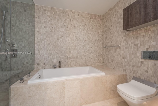 68 SE 6th St Unit 2112, Miami, FL 33131 - bathroom with plus walk in shower, tile walls, and toilet
