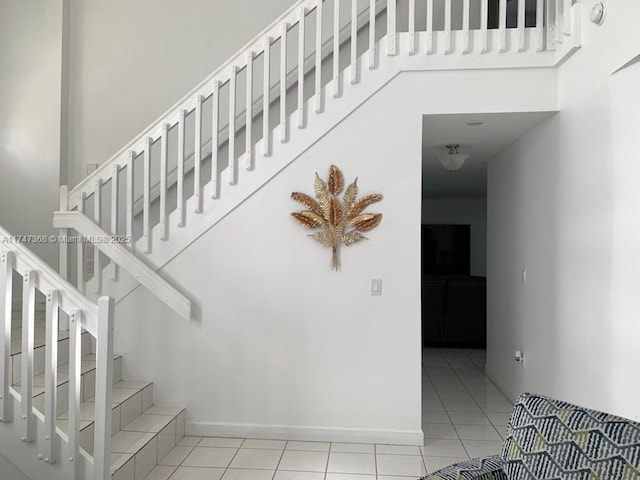 862 NW 132nd Ct, Miami, FL 33182 - staircase featuring tile patterned floors and baseboards