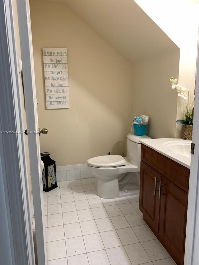 862 NW 132nd Ct, Miami, FL 33182 - half bathroom with toilet, vaulted ceiling, tile patterned flooring, and vanity