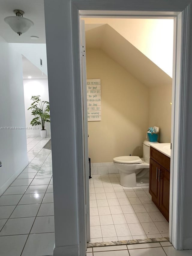 862 NW 132nd Ct, Miami, FL 33182 - half bath featuring tile patterned flooring, vanity, toilet, and lofted ceiling