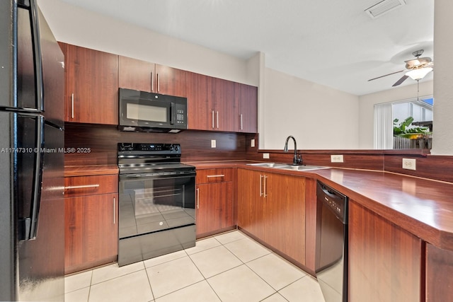 kitchen with black appliances, sink, backsplash, ceiling fan, and light tile patterned flooring