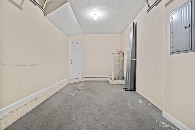 garage featuring electric panel and electric water heater