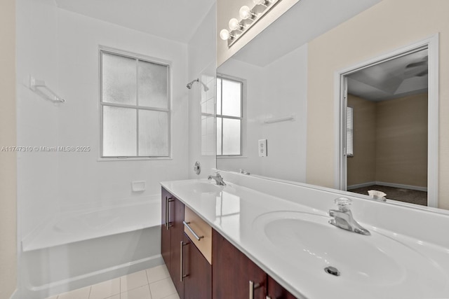 bathroom featuring tile patterned flooring and vanity