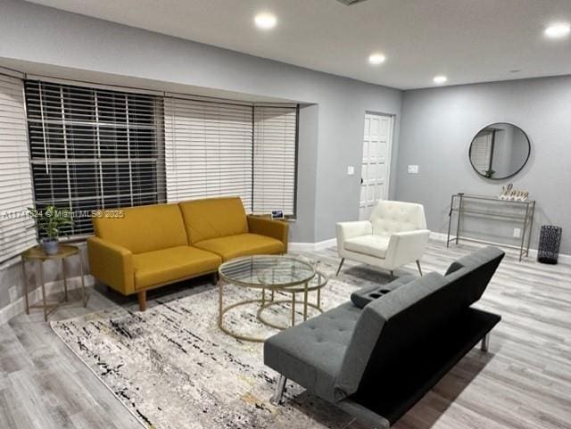 living room with light hardwood / wood-style floors