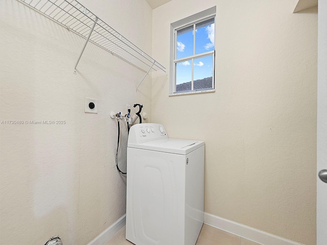 washroom featuring washer / dryer