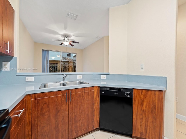 kitchen featuring stove, ceiling fan, light tile patterned flooring, sink, and black dishwasher