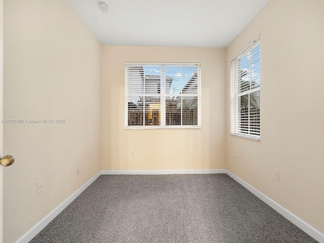 empty room with carpet floors