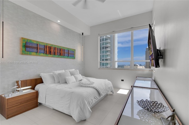 bedroom featuring light tile patterned floors