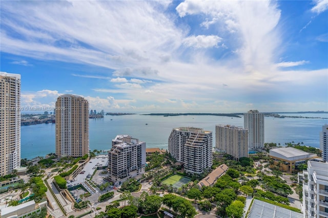 birds eye view of property with a water view