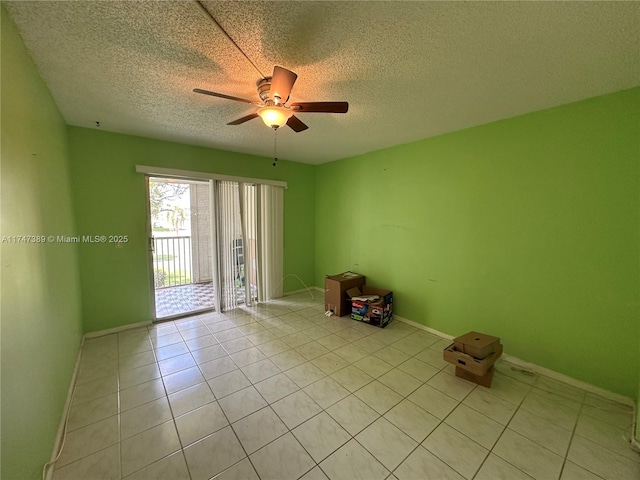 850 SW 133rd Ter Unit 201B, Pembroke Pines, FL 33027 - unfurnished room with light tile patterned floors, ceiling fan, a textured ceiling, and baseboards